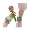 Pink and blue flower-shaped plush curtains with smiling face expressions and green stems and leaves Item Picture